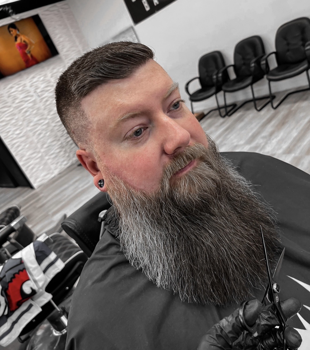 Detailed beard trim and straight razor shaping at Taper Godz Barber Co. in Lakewood